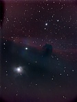 La nebulosa Cabeza de Caballo con el telescopio de 10" + reductor focal... el destello desde la izquierda es por sigma orionis, entra demasiada luz dispersada